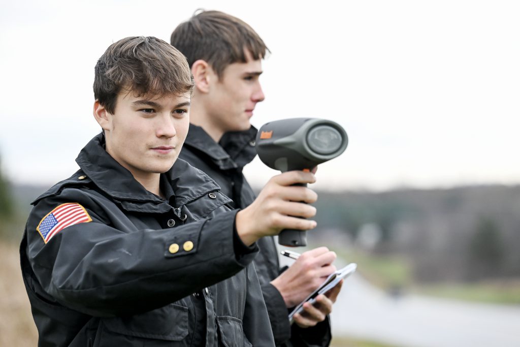 Criminal Justice student using radar gun