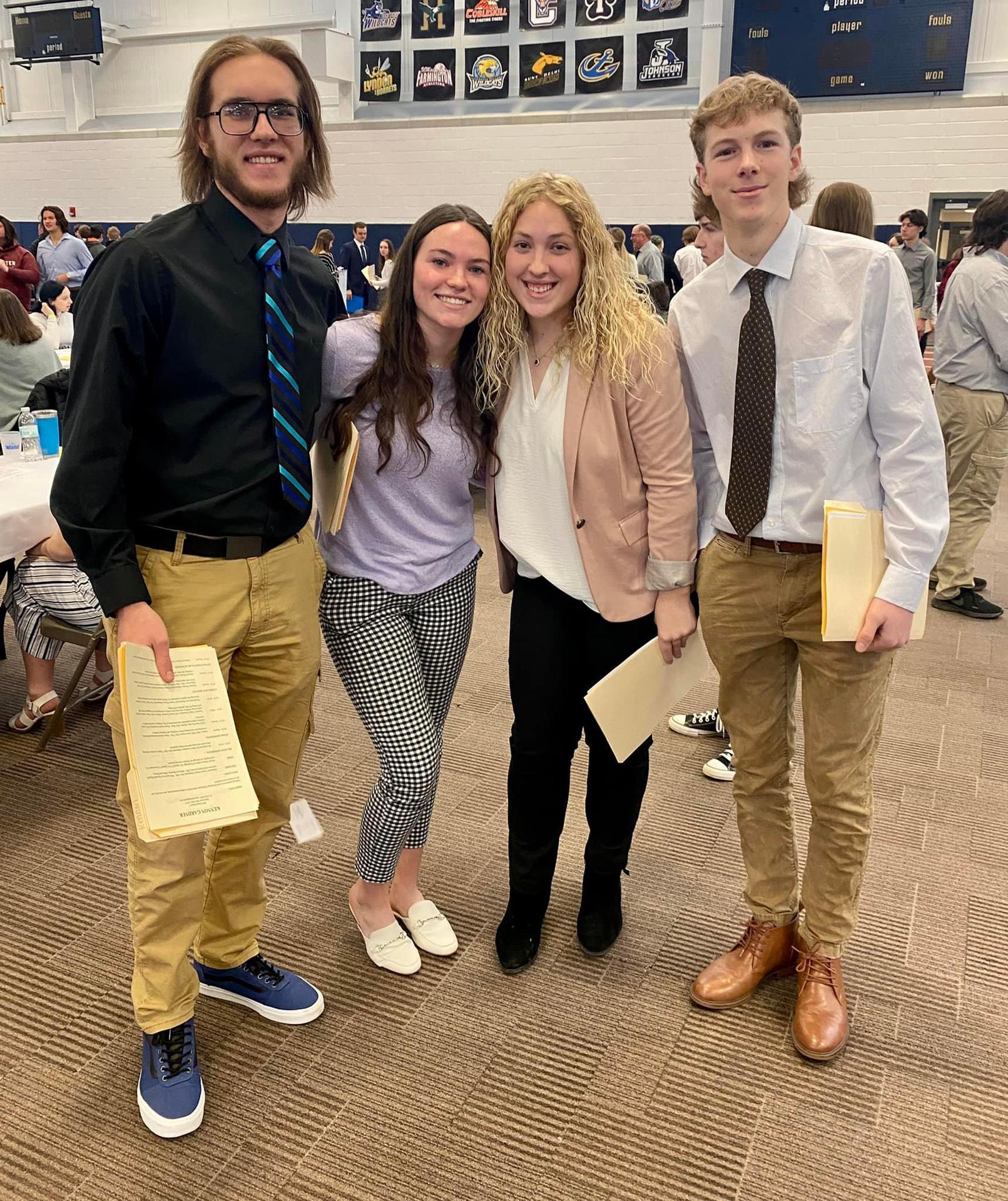 A group of students in the career workshop smiling.