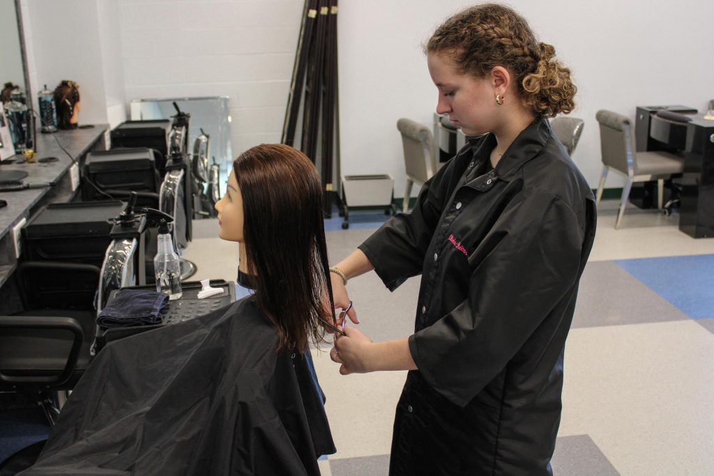 cosmetology student working