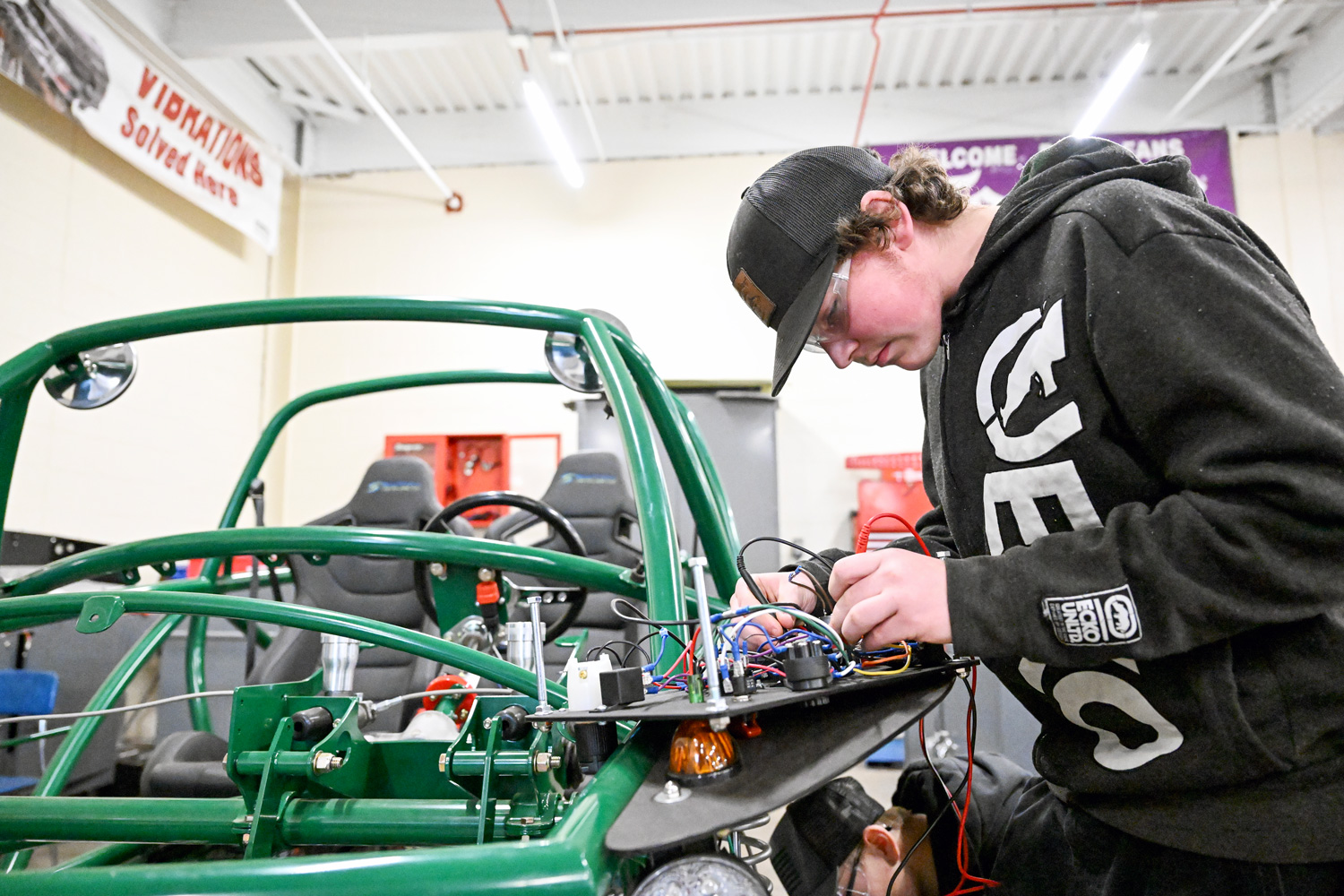 student in metal working class